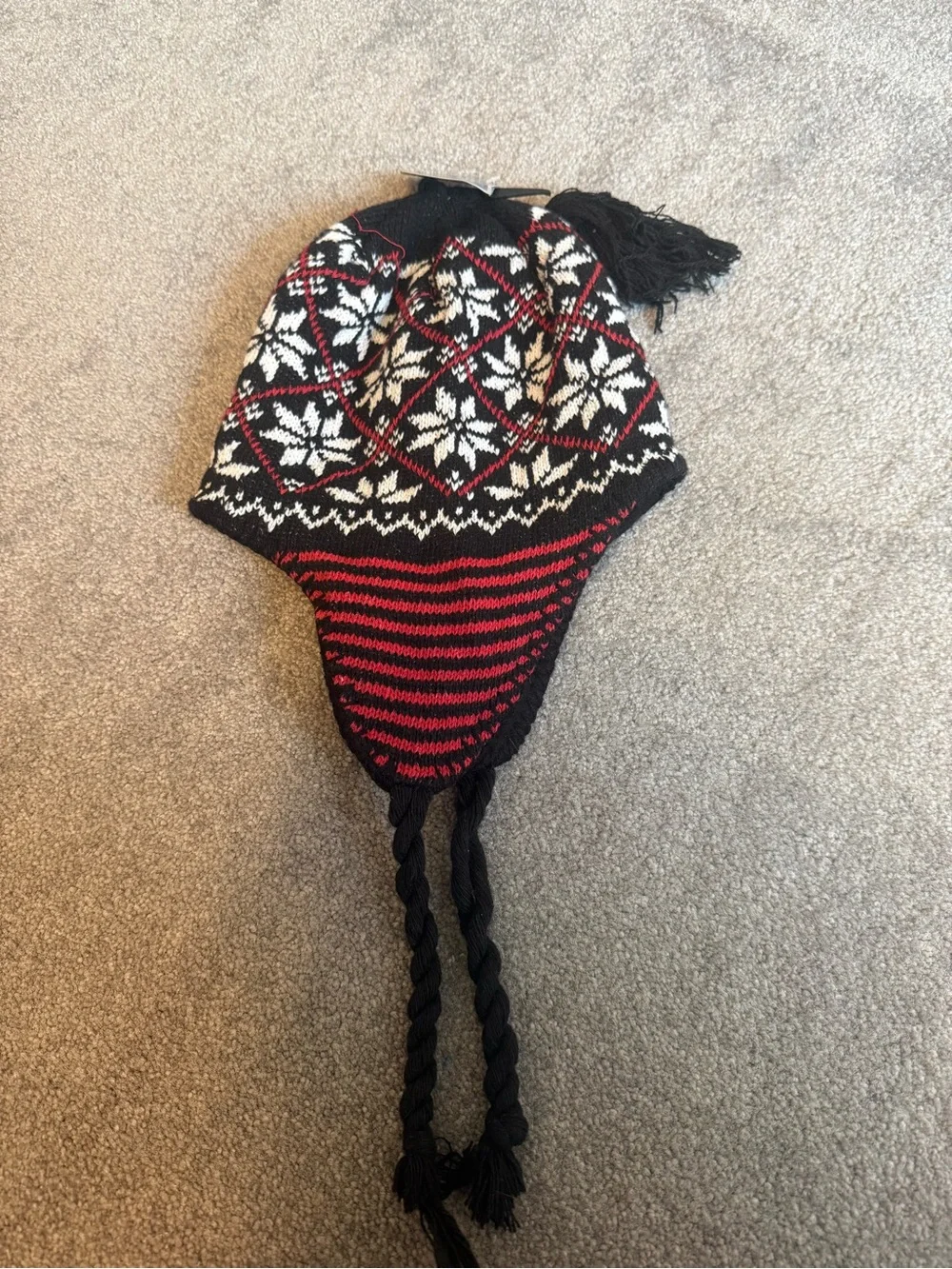 Kids Black, White & Red Knit Earflap Hat with Tassels snowflake and red detailin